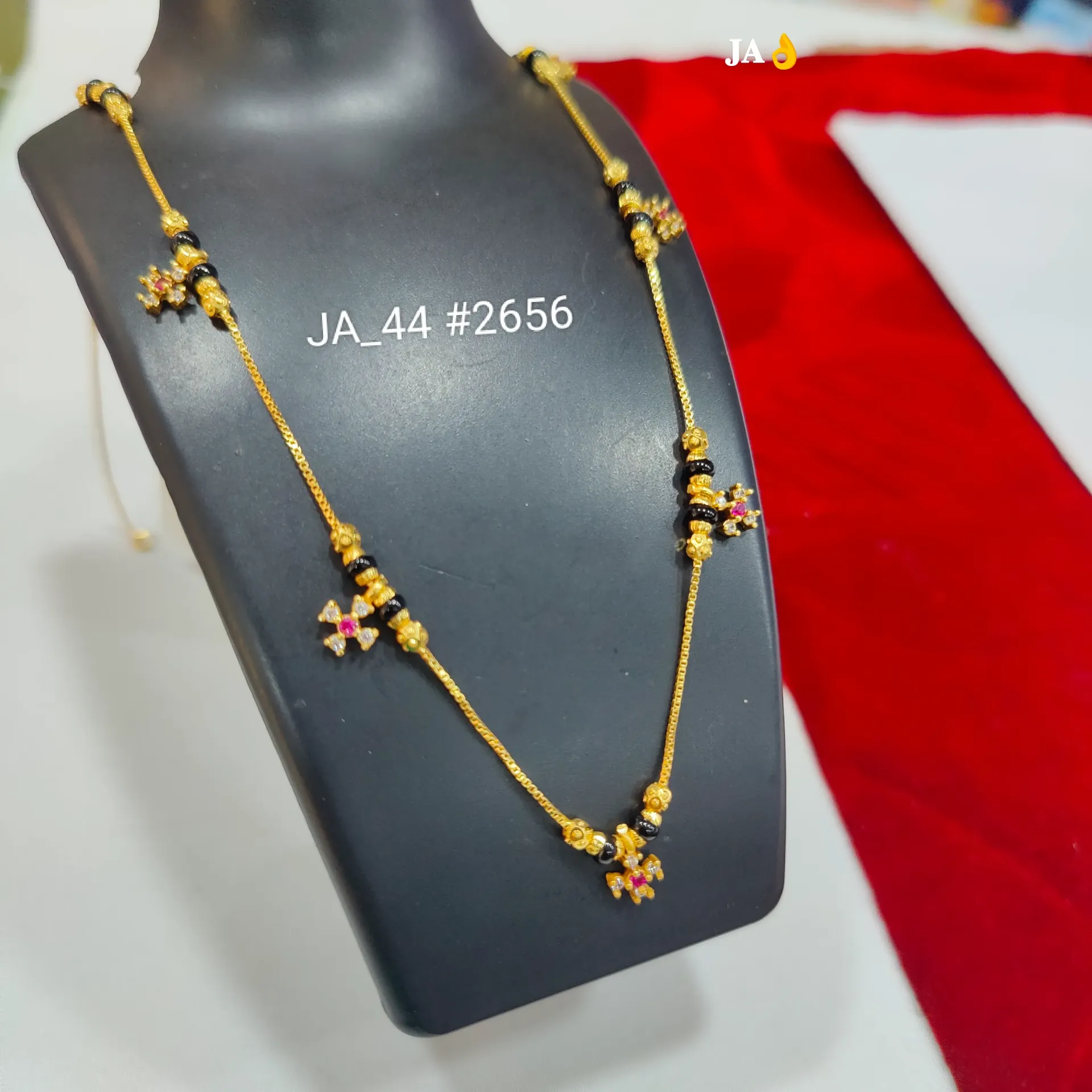 Delicate Multi-Charm Gold Mangalsutra DN - 2656